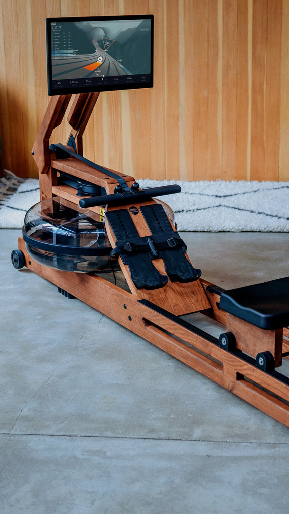 Up close of Ergatta rowing machine and tablet during race